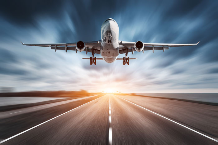 Commercial aircraft taking off runway